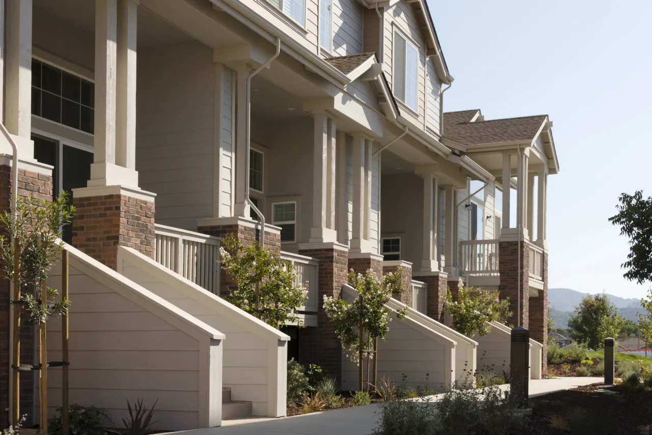 Townhome,porches,along,a,common,walkway.